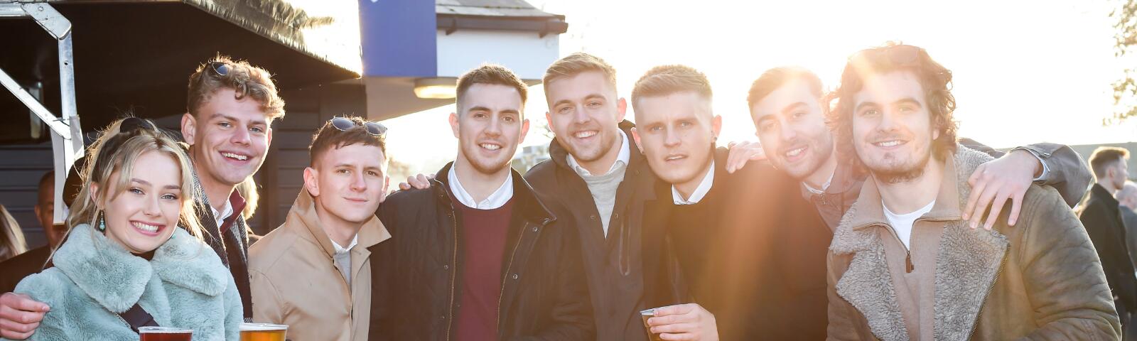 A large group of friends enjoy the races at Sedgefield